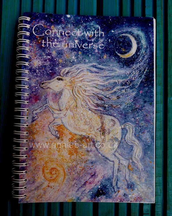 Horse spirit design notebook/ journal. Connect to the universe.&nbsp;  Inspirational notebooks/ journals, printed locally on 100% recycled thick cream plain paper in Cornwall, ideal for your dreams and wishes, sketches, journaling and more - the perfect gift for your loved ones and yourself..  Heavy 160 gms plain off white paper&nbsp;  Size A5 portrait - 14.8cm x 21 cm&nbsp; &nbsp;/ 5.8" x 8.3"  Spiral bound . Recycled , printed in Cornwall.