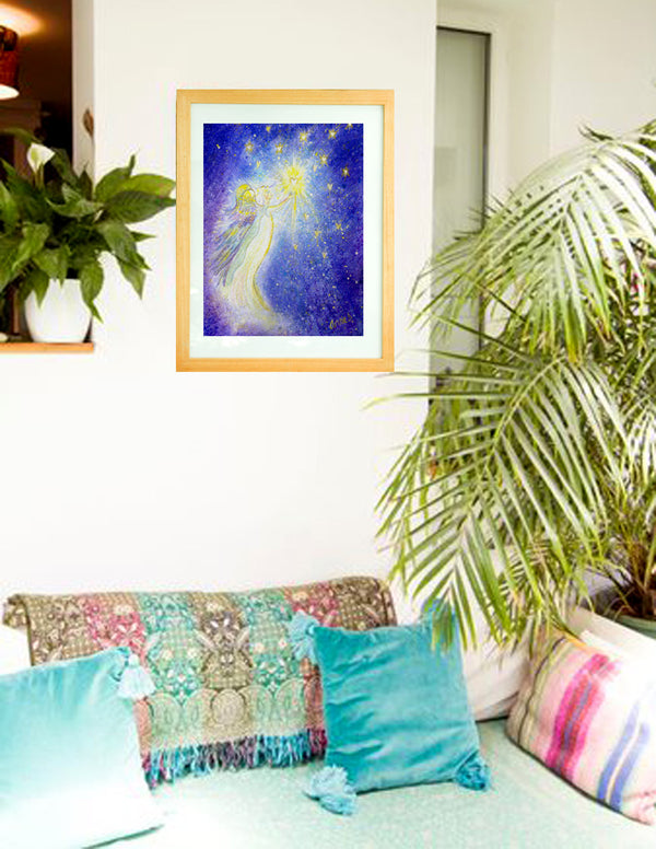 Framed print of a white angel with rainbow wings reaches up to the stars to send love and healing to the world.