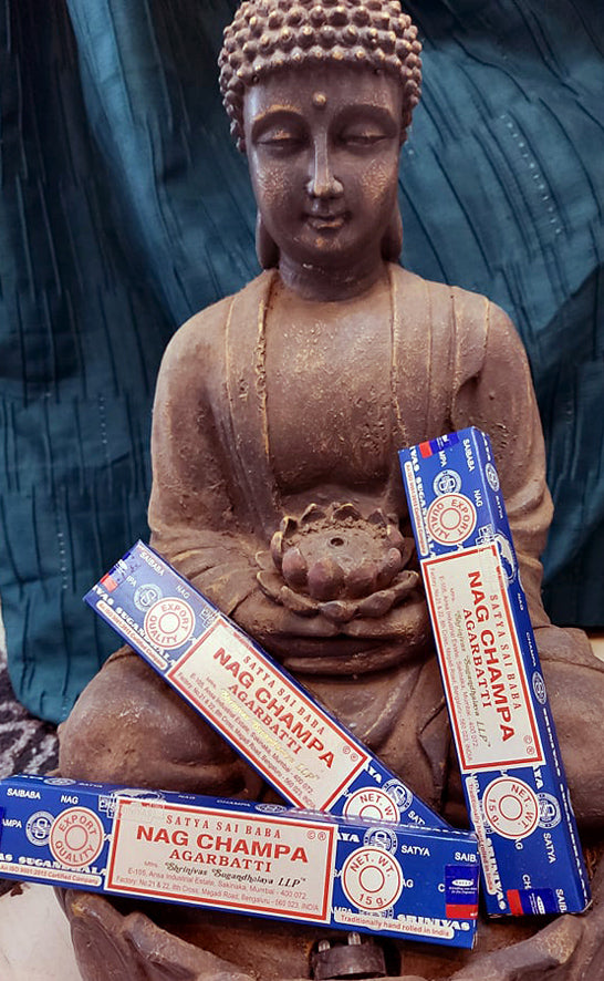 Buddha with nag champa incense