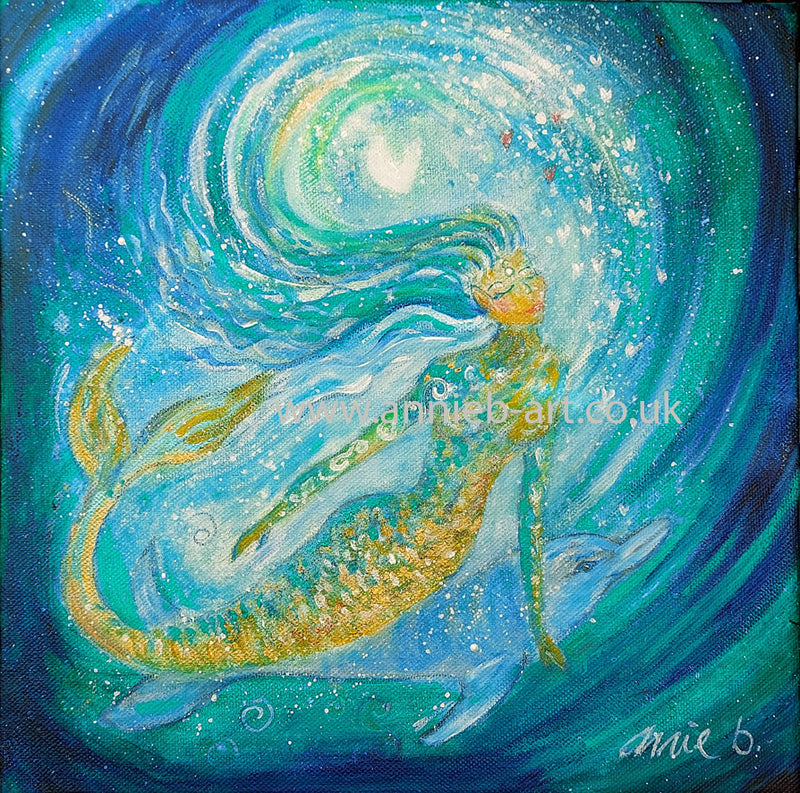 The mermaid swims with her dolphin deep within the magical ocean, reminding us of our inner mermaid and times of Atlanta