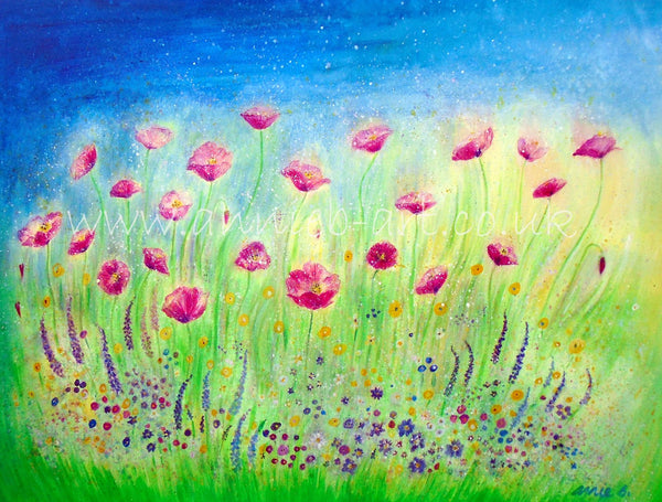 Wild pink poppies dance in the beautiful wild flower meadow under a blue summer sky.  Poppy art. Wild flower art.   Landscape fine art print available with two options to choose from printed in Cornwall: