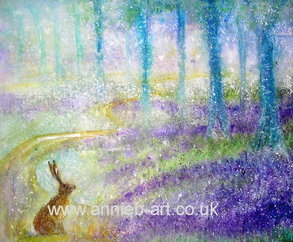 Hare sits at the beginning of the golden path that weaves through the magical bluebell woods of Tehidy Cornwall, pondering the way to go... The light shines through the trees giving a soft glow and a magical essence to this painting.  Landscape fine art print available with two options to choose from, printed in Cornwall: