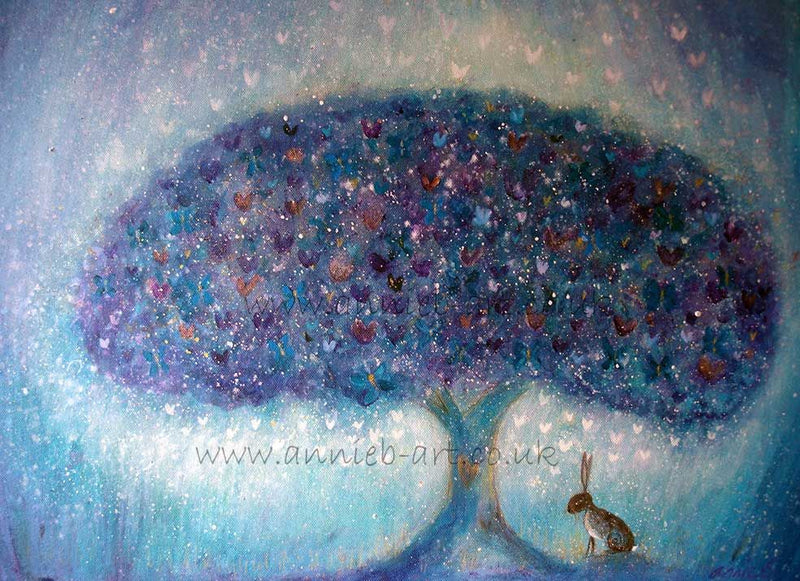 A lone hare sits contemplating the wonder of life under a magical purple tree full of hearts and butterflies.  Landscape fine art print available with two options to choose from printed in Cornwall: