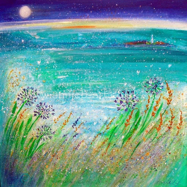 Flowers and grasses blow gently in the breeze looking out to sea to the Godgrevy lighthouse off shore from the wonderful Gwithian beach in Cornwall, in the deep turquoise ocean under a full moon inky sky.  Square format fine art print available with two options to choose from printed in Cornwall: