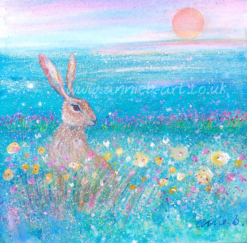 Hare sits in a field full of wild flowers under a turquoise sky feeling the love and joy of the moment   Mixed media on deep edge boxed canvas 