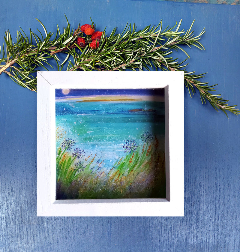 A mini print of 'With love from Gwithian', hand finished  with a touch of gold and sparkle in a white deep wooden frame  ready for your walls or the perfect gift.  Frame Size 15cm x 15cm  (6 x 6 inches). ocean art. Cornwall gifts from the sea. Cornish art. Gwithian. Godrevy