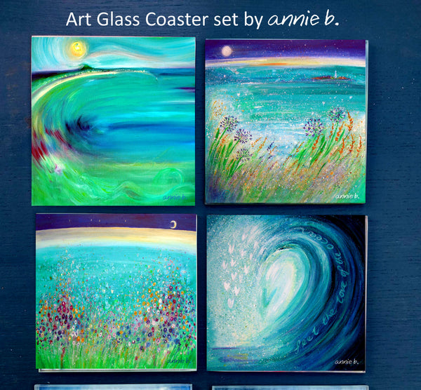 A delightful set of annie b. Art Glass Coasters with a Cornish Ocean theme x 4 Square Glass Coasters with natural gift bag, perfect for any home, beach hut or work space or gift.