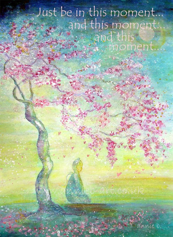 A buddha figure sits below a cherry blossom tree in mindful contemplation connecting with each moment.  Peaceful art for meditation and tranquillity for wellbeing.  Meditation art.  Portrait fine art print available with two options to choose from printed in Cornwall: