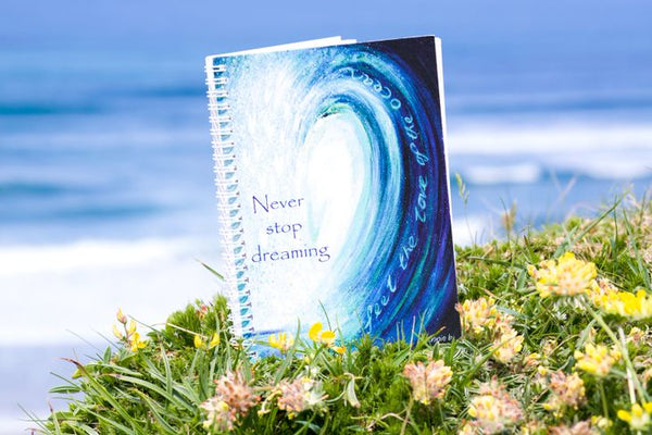 Never stop dreaming - Inspirational notebooks printed locally on 100% recycled paper, ideal for your dreams and wishes, sketches, journaling and more - the perfect gift for your loved ones and yourself.. Heavy 160 gms plain off white paper Size A5 portrait - 14.8cm x 21 cm / 5.8" x 8.3" Spiral bound . Recycled , printed in Cornwall.