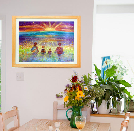 A family sit together enjoying each moment as they watch the golden sun disappear into the turquoise ocean. An inspirational painting for your children to help connect them and the whole family to the magic of the world and the moment. Meditation mindful art  A mixed medium painting on watercolour paper, mounted and framed in a pine natural frame, ready for your walls