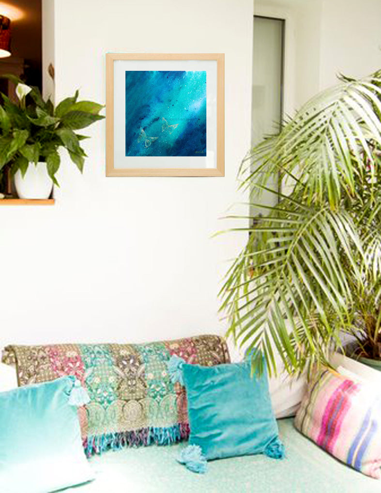 Caribbean blue fine art giclee print mounted and framed with a natural wooden frame.  This magical image was created as part of a set of three paintings of the white butterflies flying over the turquoise Caribbean ocean inspired by a magical event that occurred on our wedding day, when just before the ceremony thousands and thousands of white butterflies were seen flying over the ocean and beach where our ceremony was taking place