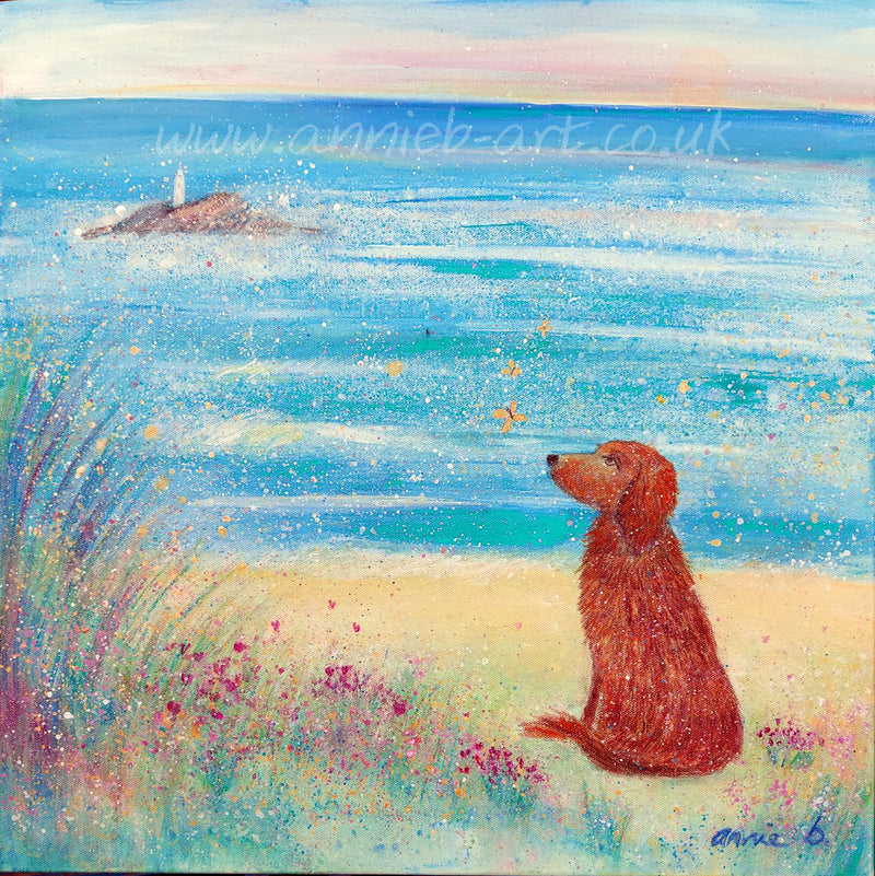 This magical painting by Cornish artist annie b. depicts a beautiful dog watching butterflies in the wild flowers on the sandy shore at Godrevy beach Cornwall