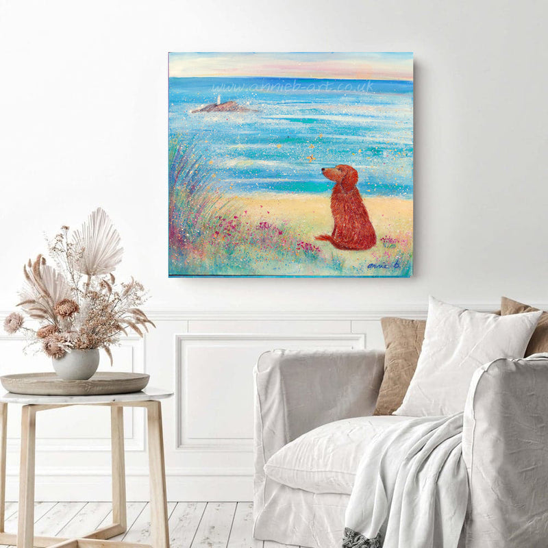 This magical painting by Cornish artist annie b. depicts a beautiful dog watching butterflies in the wild flowers on the sandy shore at Godrevy beach Cornwall